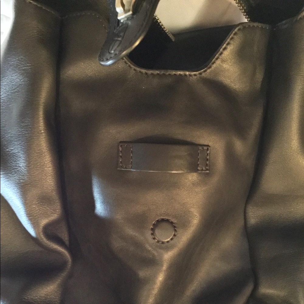 Aritzia’s Six Eleven black leather McDuffle - Picture 11 of 14